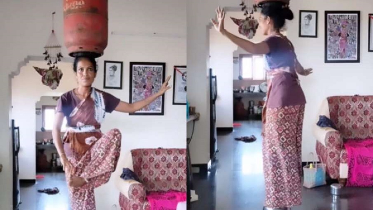 Woman dances with gas cylinder on her head, performs stunts | WATCH