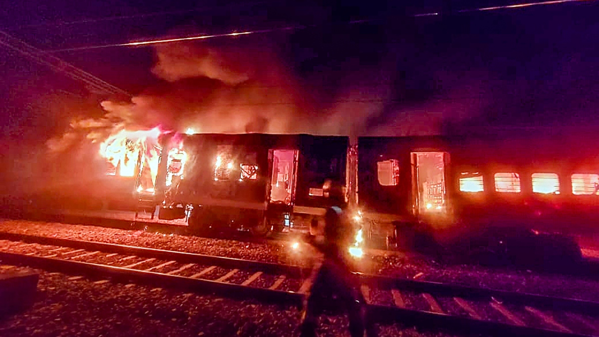 Fire and smoke billows out after a massive fire broke out in coaches of the Darbhanga Express 
