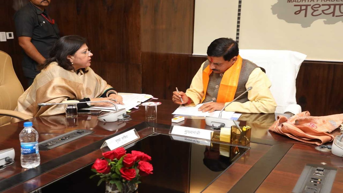 Chief Minister Mohan Yadav signs an order on the first day at the office. 