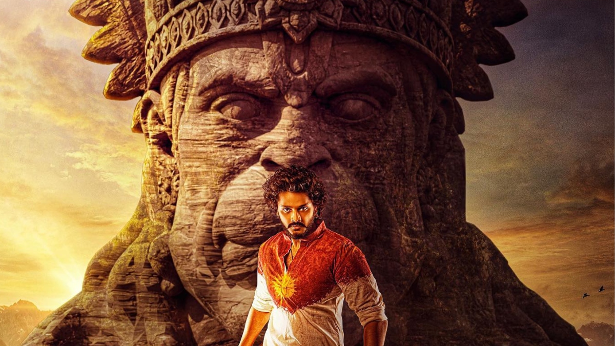 Rana takes off shoes before posing in front of HanuMan poster