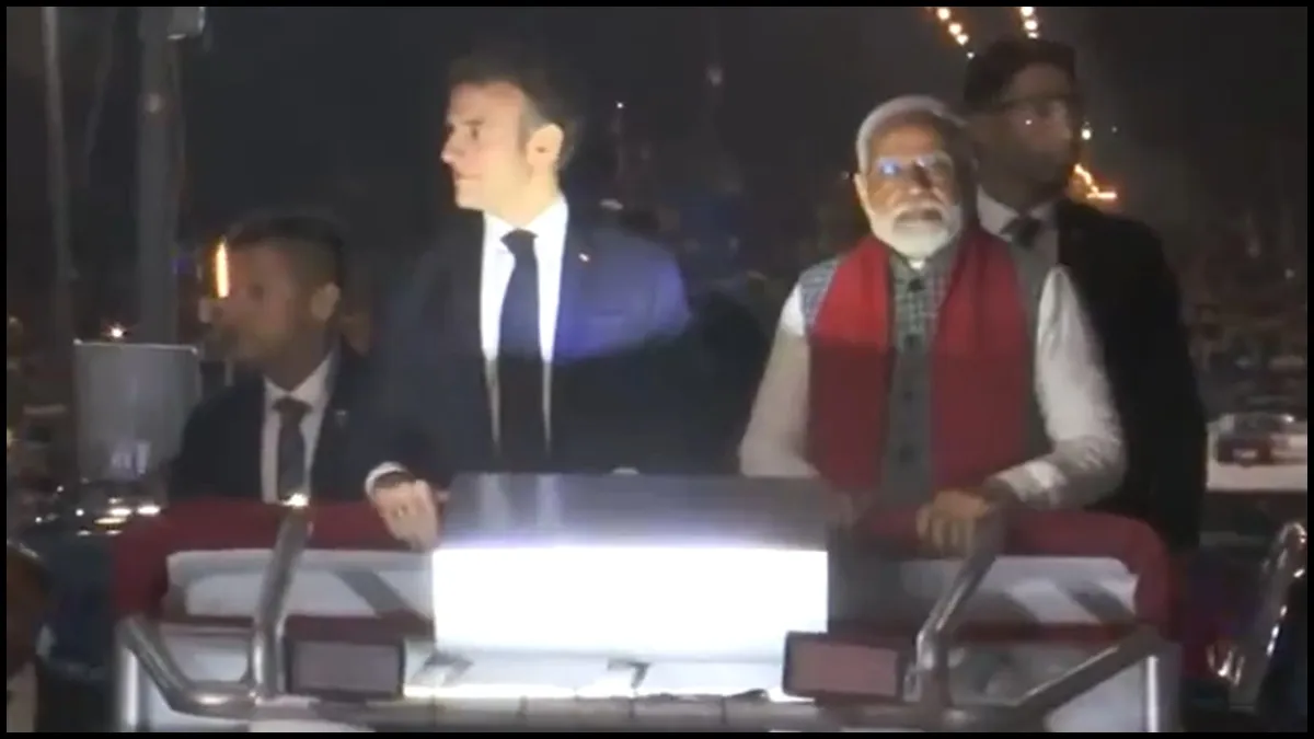 French President Emmanuel Macron and PM Modi during a roadshow in Jaipur.