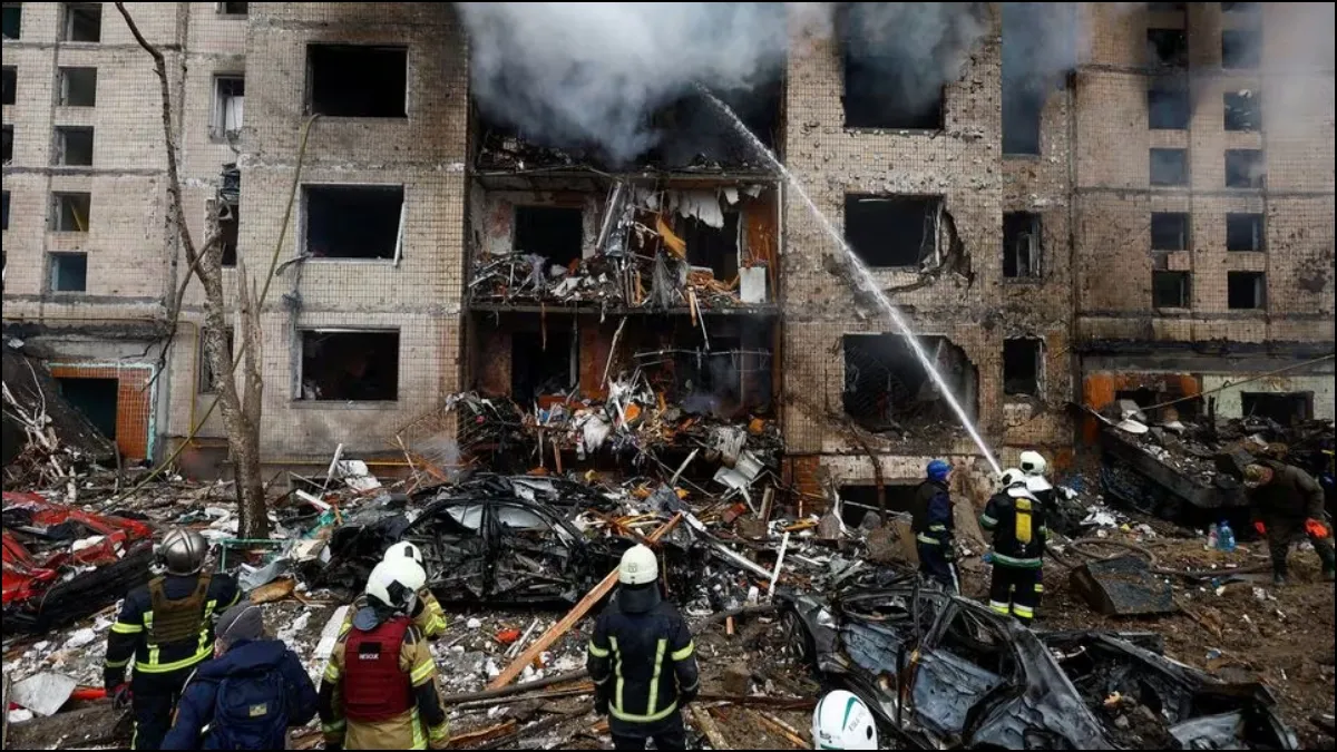 Firefighters at a building in Kyiv that was damaged after a Russian missile attack.