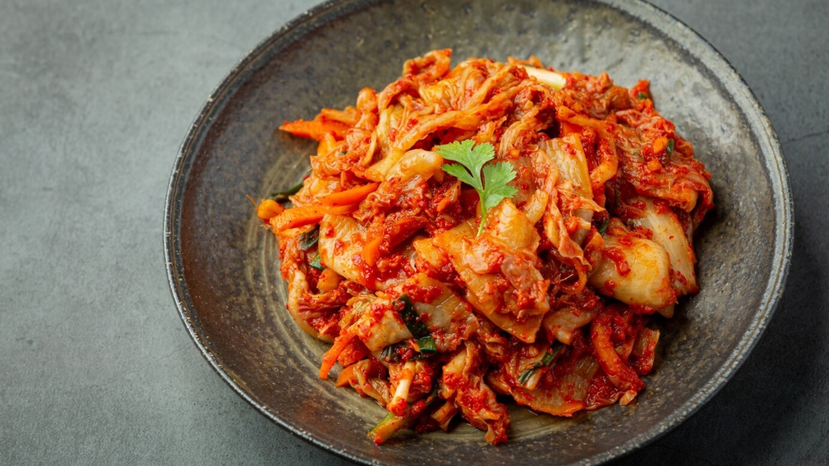 Eating up to three servings of 'Kimchi' daily may help reduce a few kilos, says new study