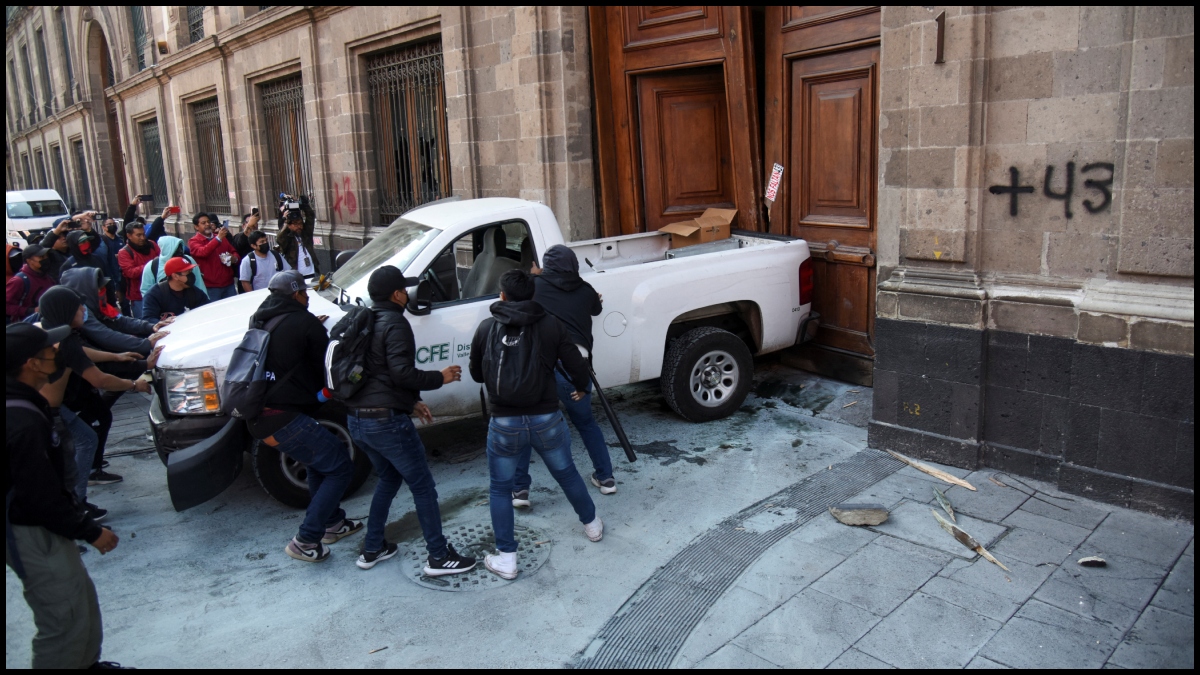 Mexico: Protesters knock down door of presidential palace over ...