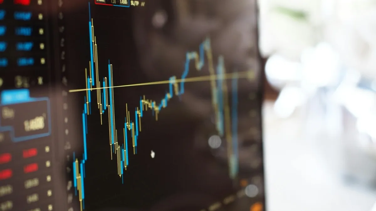 Stocks showing on the monitor.