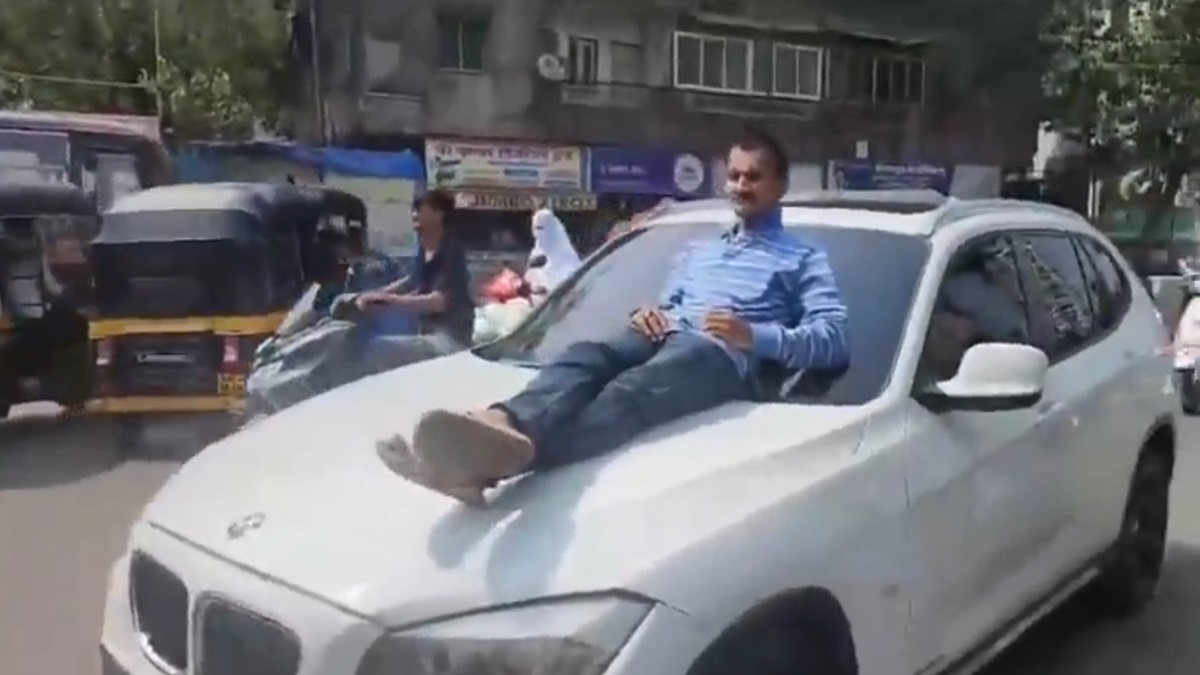 Mumbai teenage boy drives man on BMW bonnet on busy Kalyan road, father booked | WATCH