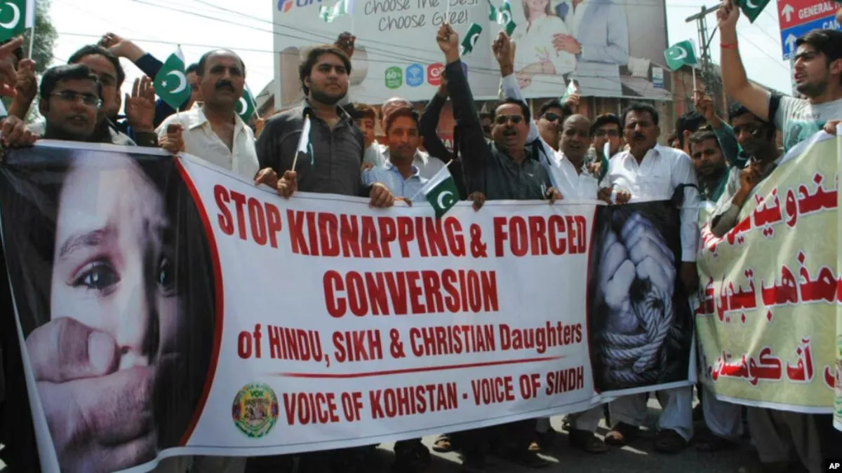 Pakistani civil society activists rally for protection of Hindu girls at a protest in Hyderabad, Pakistan, July 4, 2019.