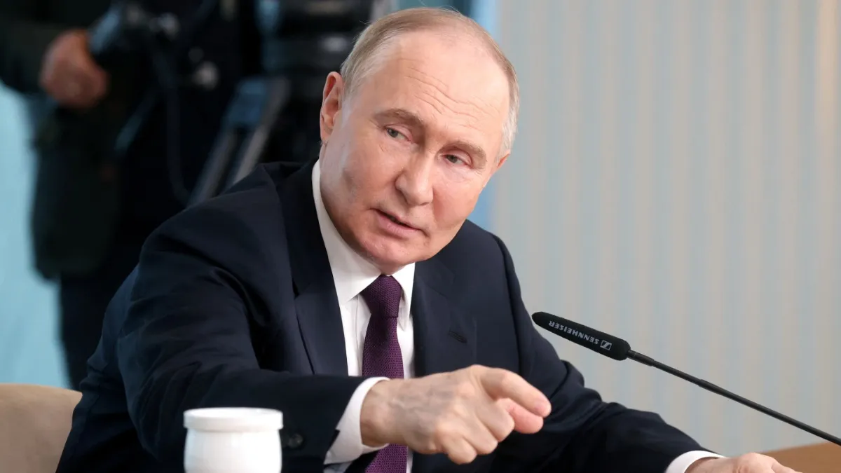 Russian President Vladimir Putin speaks during a meeting with senior editors from international news agencies at the Lakhta Centre business tower in Saint Petersburg, Russia.