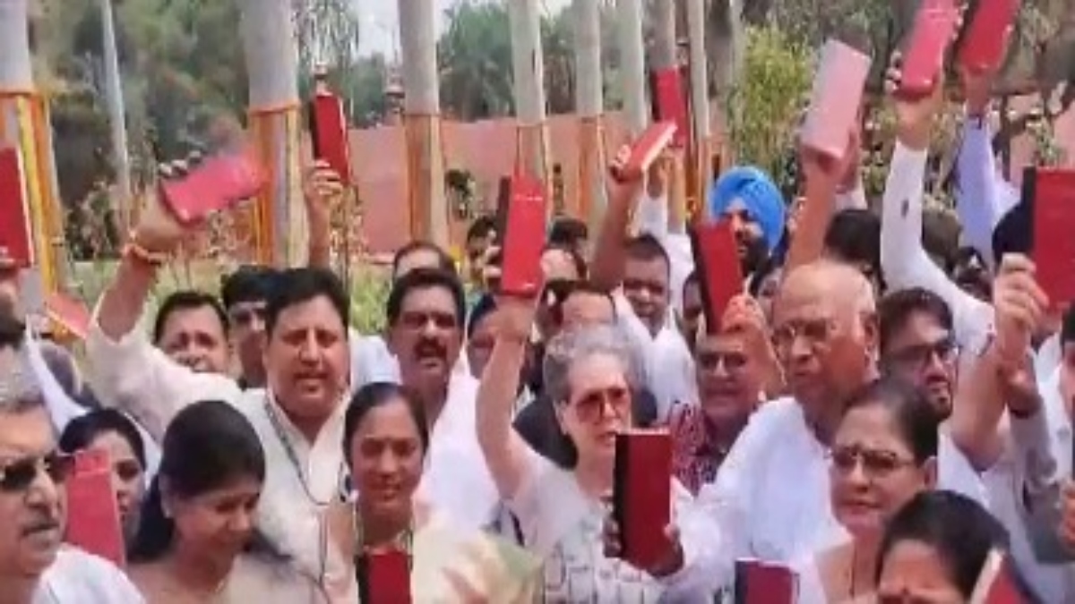 INDIA bloc leaders protest in Parliament holding copies of Constitution ...