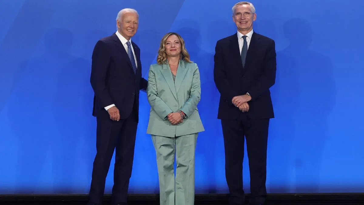  Italian Prime Minister Giorgia Meloni stands with U.S. President Joe Biden and NATO Secretary General Jens Stoltenberg as she attends NATO's 75th anniversary summit in Washington.