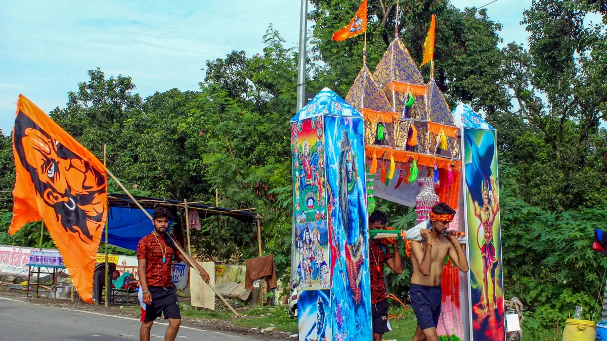  Lord Shiva devotees or ‘Kanwariyas’ walk during the Kanwar Yatra 