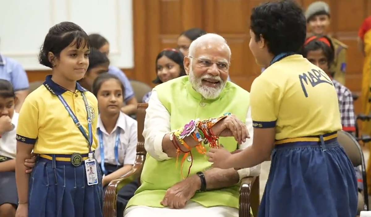 PM Modi celebrates Raksha Bandhan with school children in Delhi, extends greetings | Watch