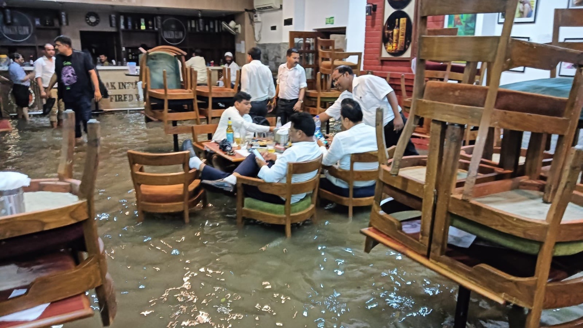 Delhi turns into swimming pool after heavy rainfall, netizens share videos | WATCH