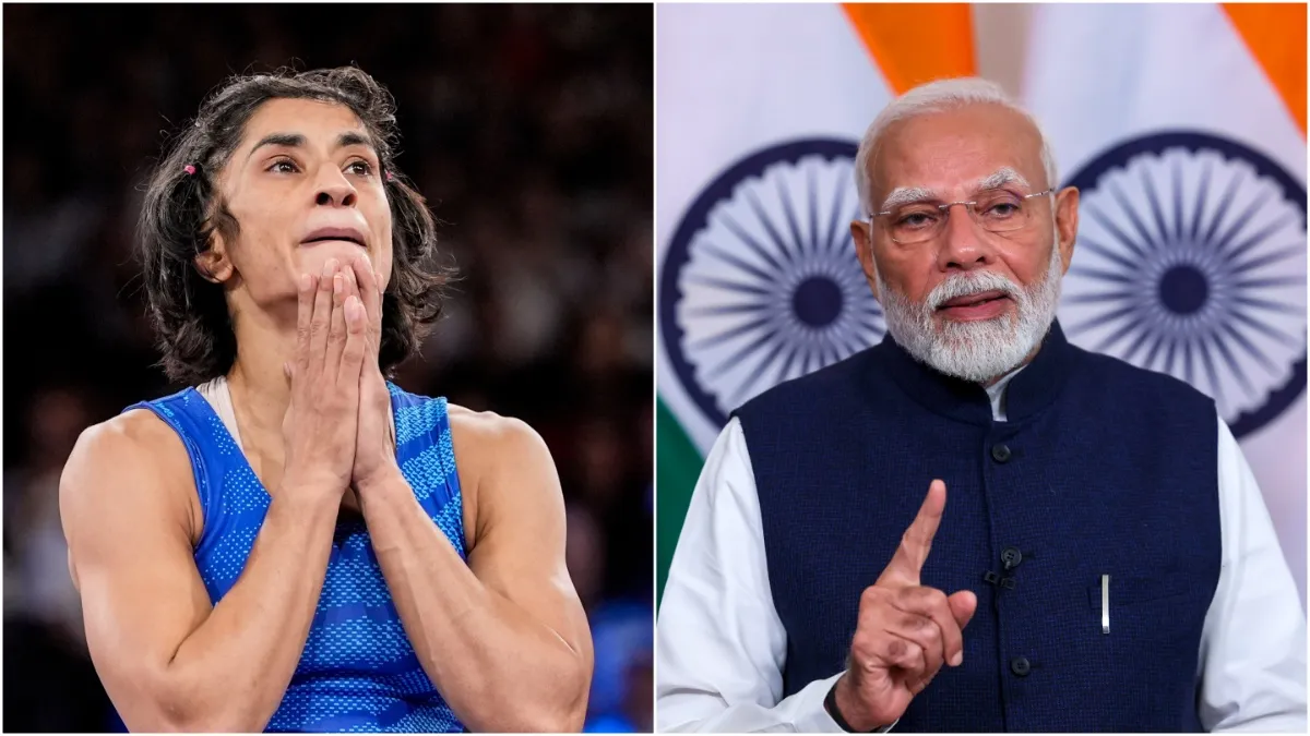 PM Modi and wrestler Vinesh Phogat.