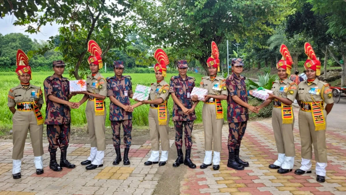 Nadia: An all-women unit of the Border Security Force (BSF) presents sweets to the women personnel of Border Guard Bangladesh (BGB) on the 78th Independence Day, at the India-Bangladesh border, in Nadia district.
