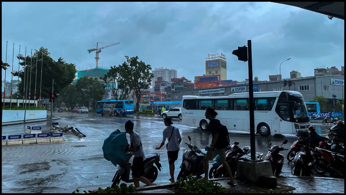 People take shelter under a bridge amid the impact of Typhoon Yagi, in Hanoi, Vietnam.