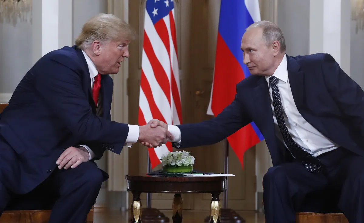 Russia's President Vladimir Putin shakes hands with then-US President Donald Trump during a meeting on the sidelines of the G20 summit in Osaka, Japan June 28, 2019.
