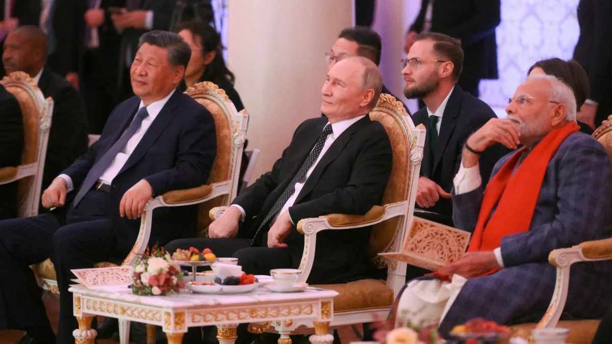 Chinese President Xi Jinping, Russian President Vladimir Putin and Indian Prime Minister Narendra Modi attend a concert before an informal dinner on the sidelines of the BRICS Summit in Kazan