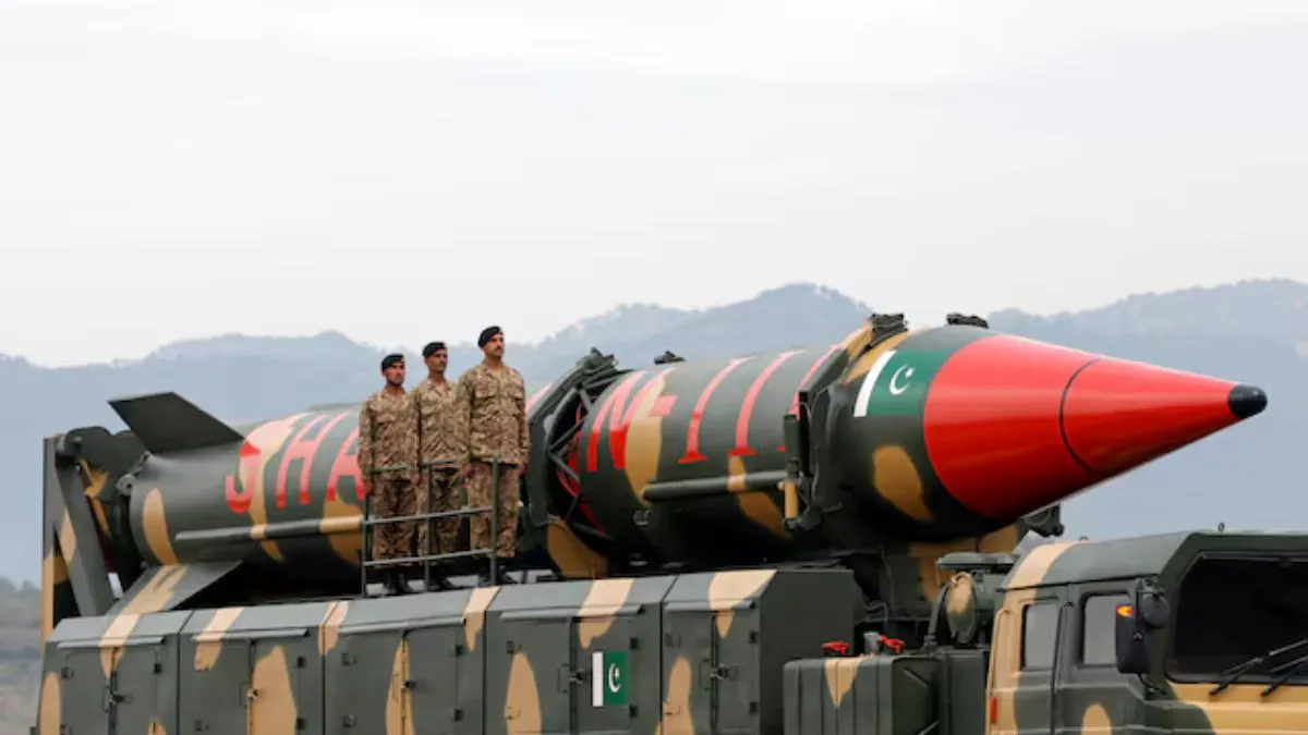 Pakistani military personnel stand beside a Shaheen III surface-to-surface ballistic missile during the Pakistan Day military parade in Islamabad, Pakistan March 23, 2019