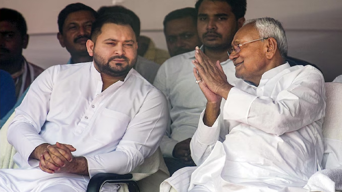 Nitish Kumar's picture patting Tejashwi Yadav's shoulder at Bihar Raj Bhavan goes viral | See photo