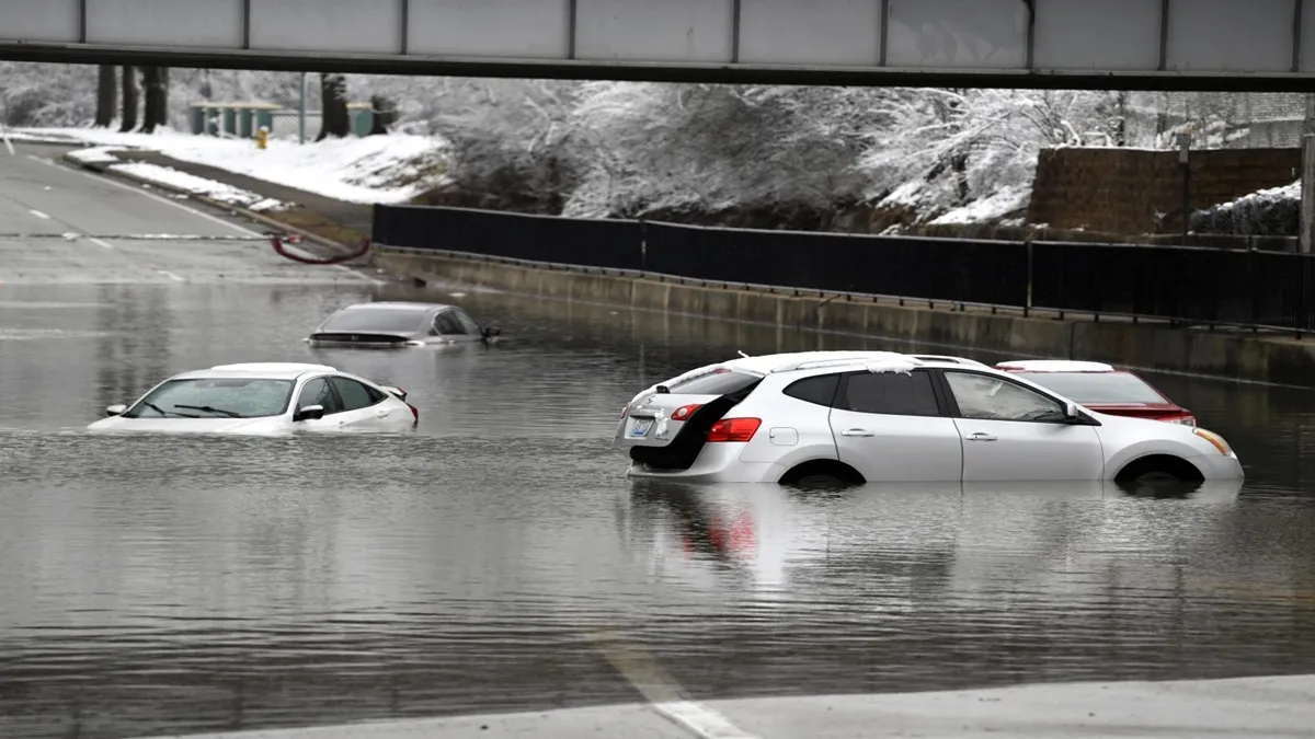 Car stuck in floodwaters in Louisville, Kentucky 