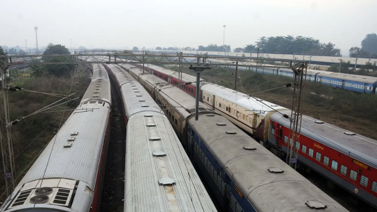 Passenger trains parked at the railway station yard after Indian Railways cancelled trains.