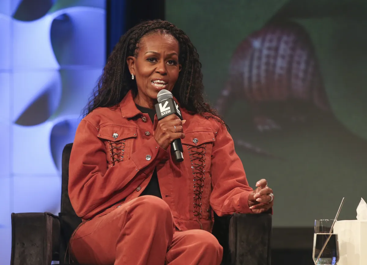 Michelle Obama dismisses renewed divorce speculation with husband Barack Obama, on a podcast.