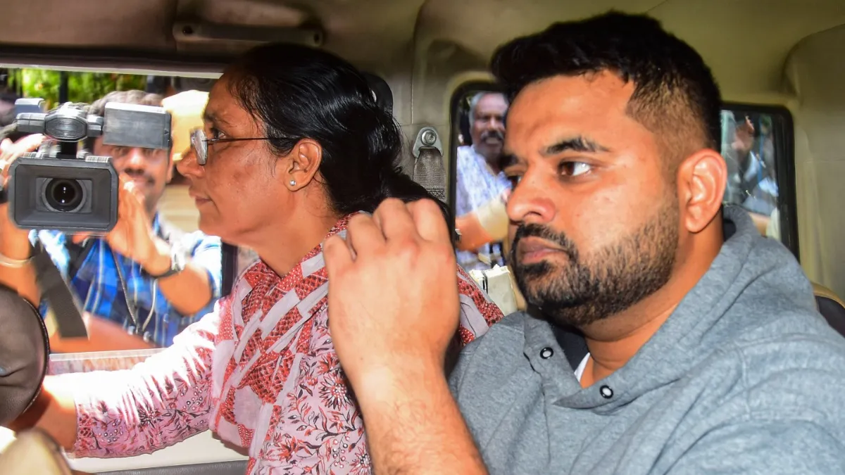 Suspended JD(S) MP Prajwal Revanna, facing allegations of sexually abusing several women, is being taken to a hospital for medical examination under tight security, in Bengaluru.