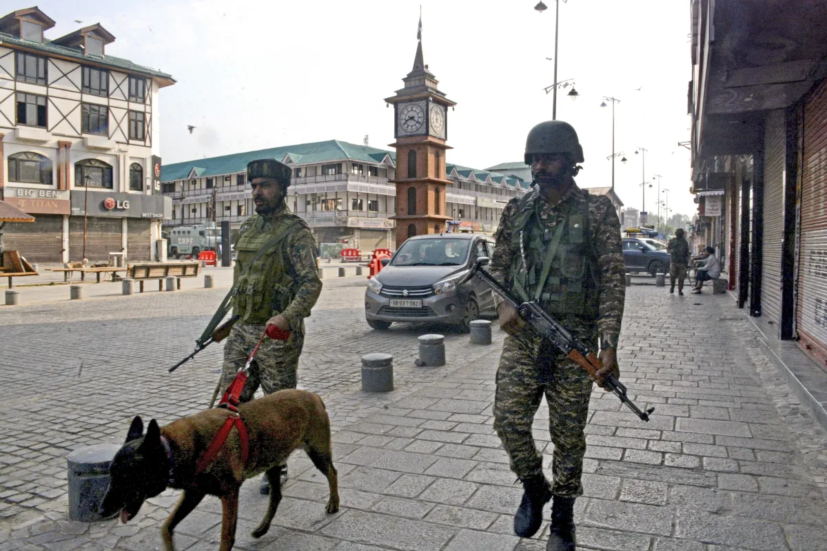 Srinagar: Security personnel with a sniffer dog patrol after Indian armed forces carried out missile strikes on terror targets in Pakistan and PoK under Operation Sindoor.