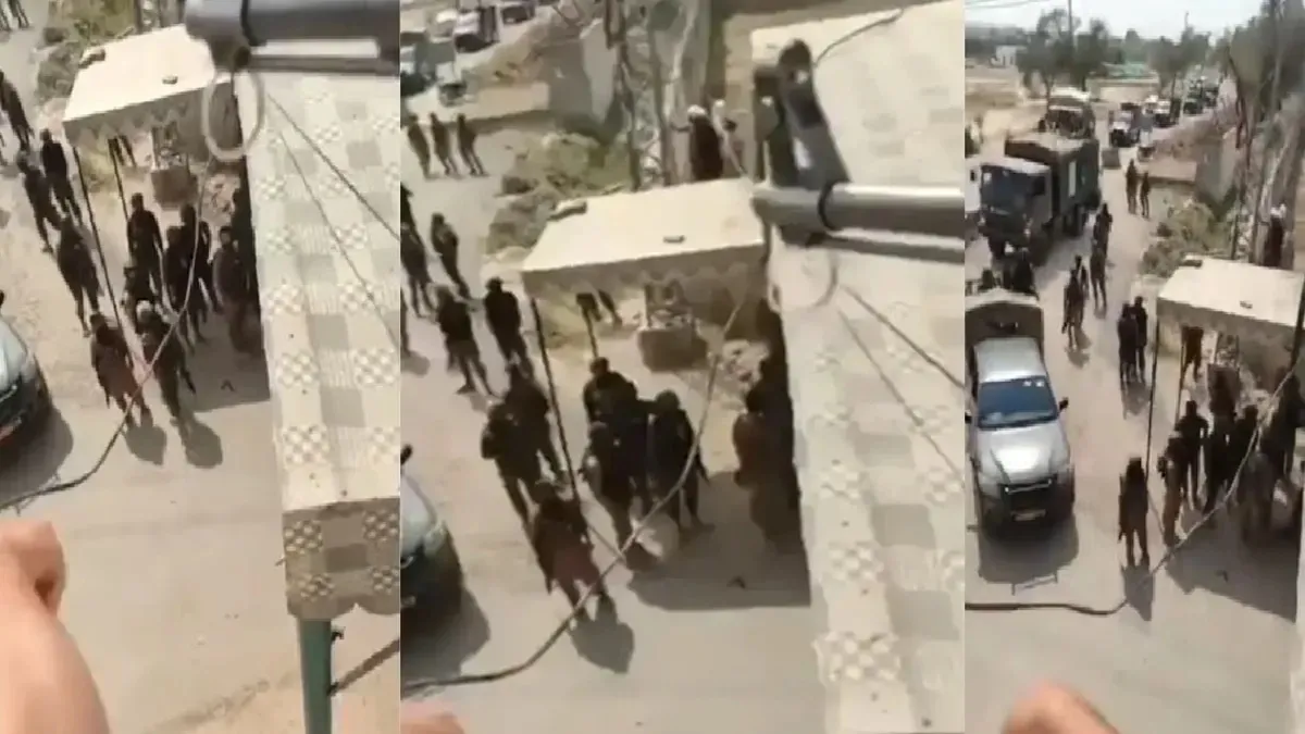 A Pashtun police officer in Khyber Pakhtunkhwa province is seen blocking a convoy of the Pakistani Army