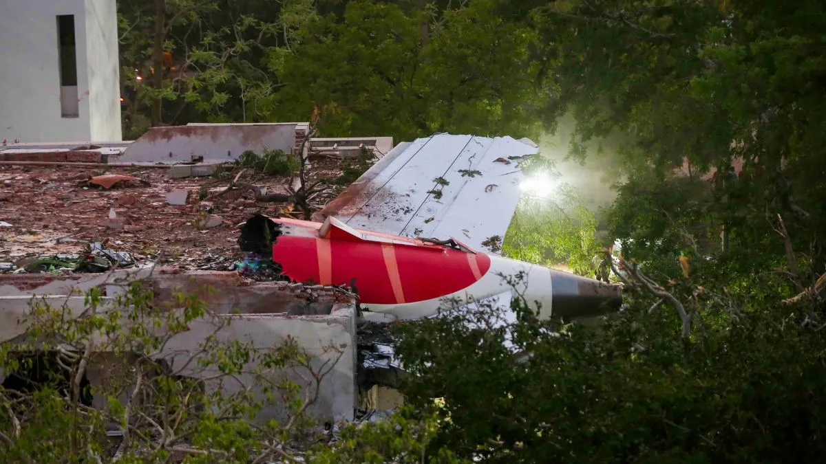 Wreckage of the Air India plane that crashed lies on a building in Ahmedabad. 