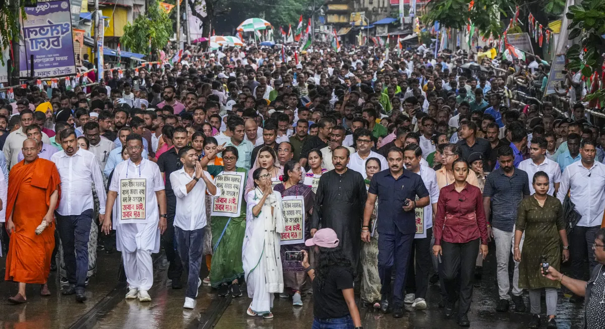 Mamata Banerjee at a rain-soaked protest rally in central Kolkata on Wednesday.