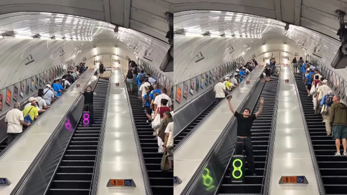 A man performs Bhangra on a London Underground escalator.
