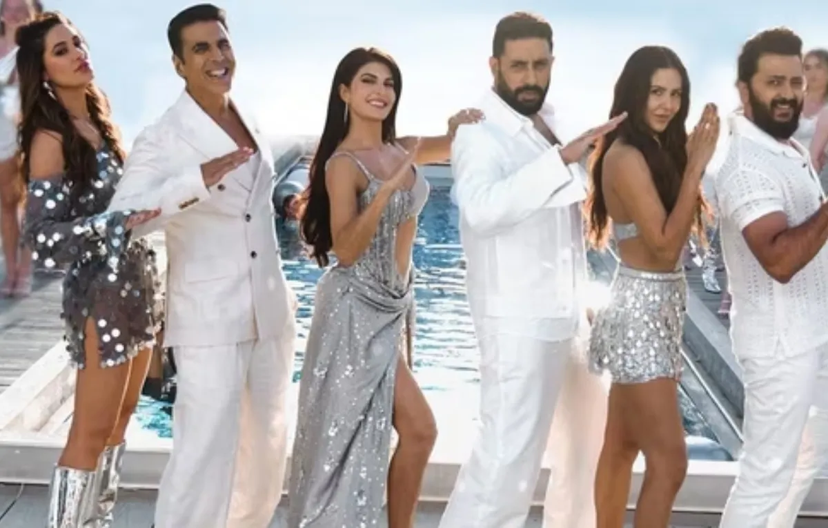 Cast of Housefull 5, a new OTT release, striking a dance pose in a glitzy music sequence