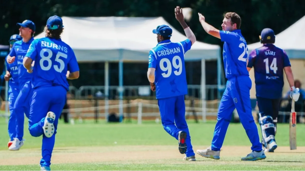 Italy players celebrate Ollie Hairs' wicket during the T20 World Cup Qualifiers clash in The Hague