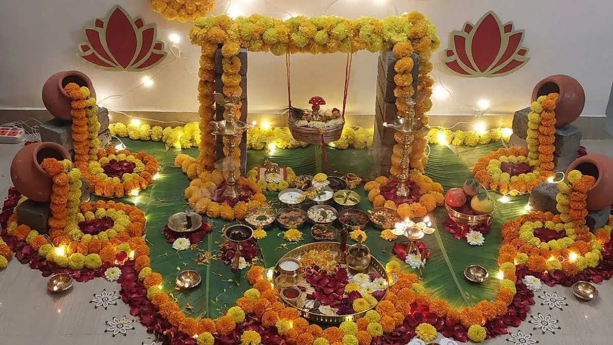A colourful Janmashtami puja setup featuring a flower-adorned swing for Bal Gopal, clay pot decor, and traditional festive arrangements.