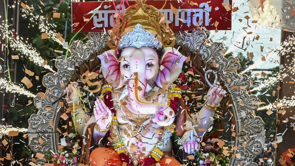 People carry an idol of Lord Ganesha in Nagpur.