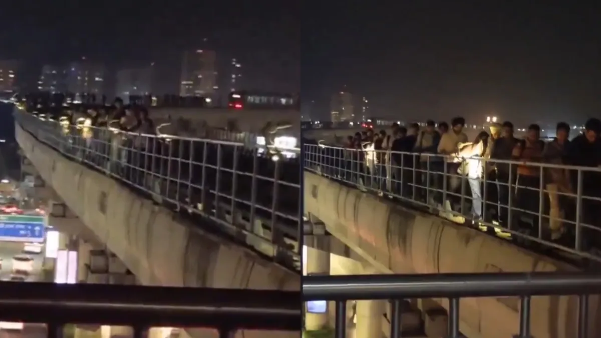 Passengers were seen walking on tracks after the Gurugram Rapid Metro was hit by a power outage