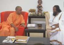 Uttar Pradesh Chief Minister Yogi Adityanath with Sri Sri Ravi Shankar