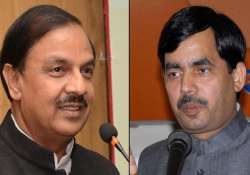 Union Culture Minister Mahesh Sharma and BJP leader Shahnawaz Hussain. 