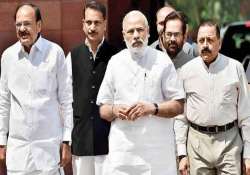 PM Modi shakes hands with Opposition leaders in Rajya Sabha