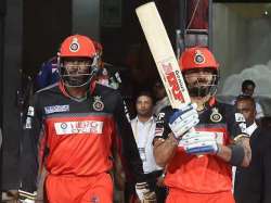 Virat Kohli with Chris Gayle