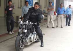 MS Dhoni riding Confederate X132 Hellcat