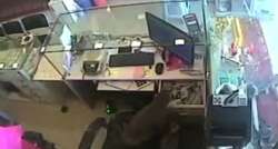 Still from the video of monkey stealing money from the cash counter