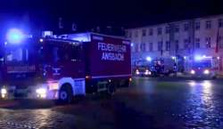 Fire trucks and ambulances stand in the city center of Ansbach after blast 