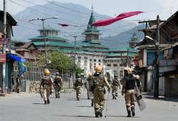 CRPF Jawans patrolling a street in Srinagar