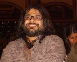 Pritam reveals what it is like working with Karan Johar