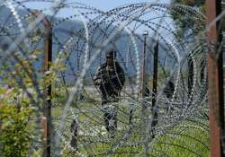 A file photo of an Indian Army soldier patroling along the LoC.
