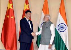 PM Narendra Modi meets Chinese President Xi Jinping in Goa at BRICS 2016