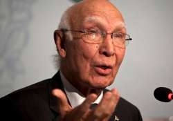 File pic - Sartaz Aziz speaks to media in Islamabad 